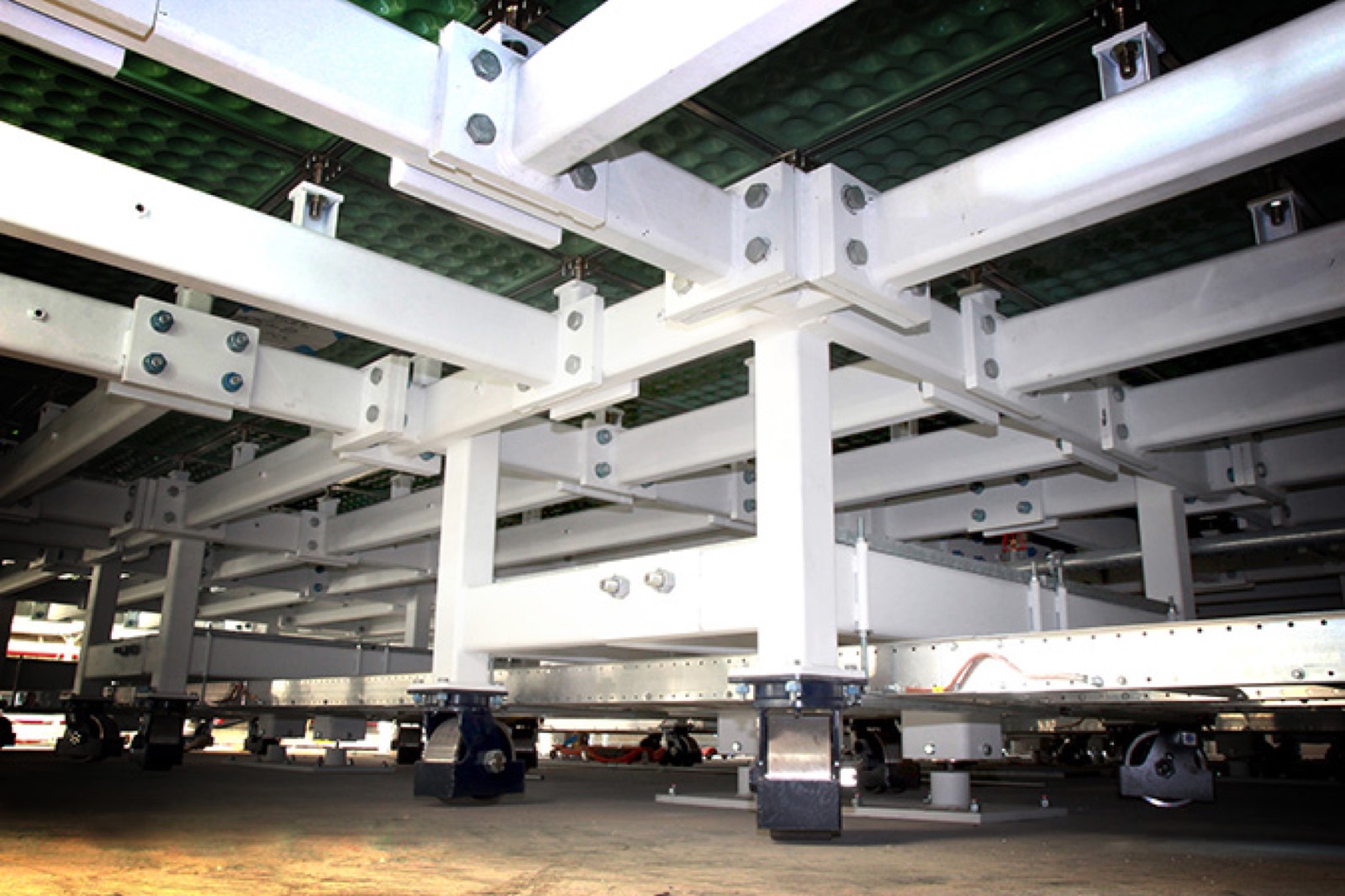 Underside of an isolated floor showing the isolation modules